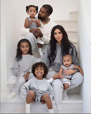 Kanye West and Kim Kardashain with their four children